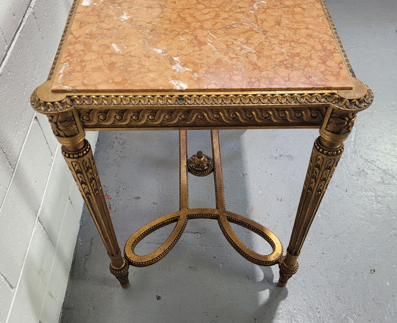 Antique French Louis XVI style gilt center table with a stunning marble top. Featuring stunning ornate carving and it is in great original condition