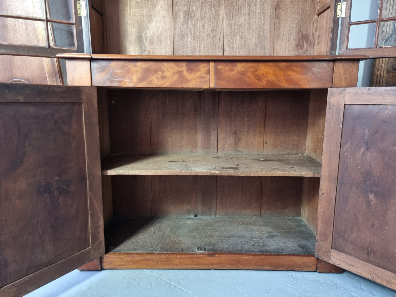Rare early Australian colonial full Cedar bookcase. Plenty of storage underneath and glass top doors open up too three fully adjustable shelves. In good restored condition.