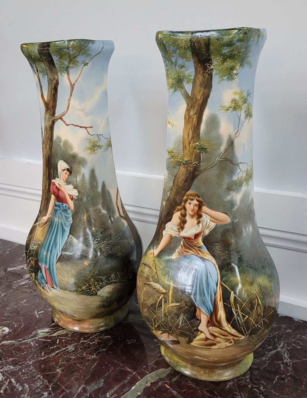 Pair of Victorian hand painted decorative vases depicting women. Please view photos as they help form part of the description.