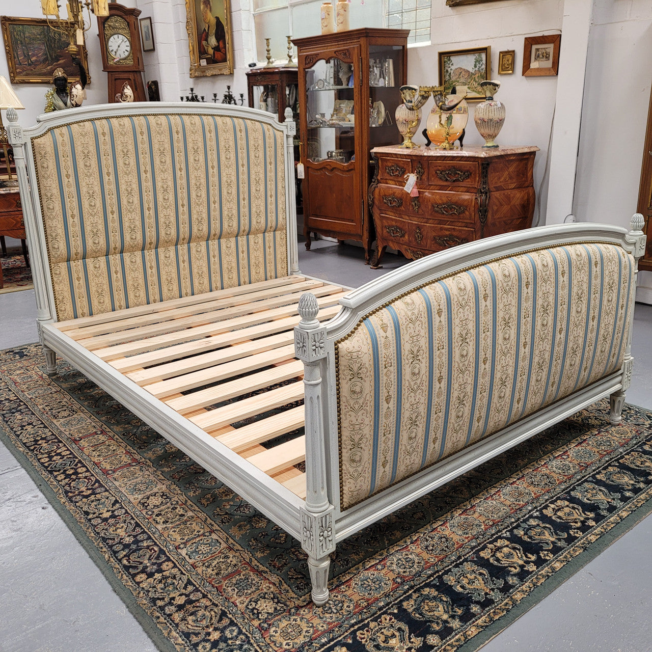 French Louis 16th style double bed and rails with original crackle paint. It also has good quality upholstery. Bed comes complete with custom made slats. Just place your mattress on top. Sourced from France and in good original detailed condition.