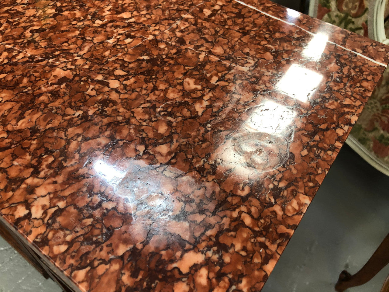 A pair of French Oak Arts and Crafts bedside cabinets with marble tops and a drawer and cupboard for storage in good condition.