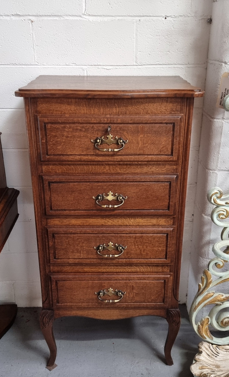 Elegant French Oak Louis XV style four drawer chest of drawers. It has lovely carvings and it is in good original detailed condition. It has been sourced from France.