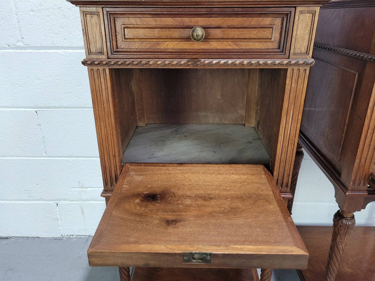 Pair parquetry Walnut bedside cabinets with white inset marble tops. In good original detailed condition.