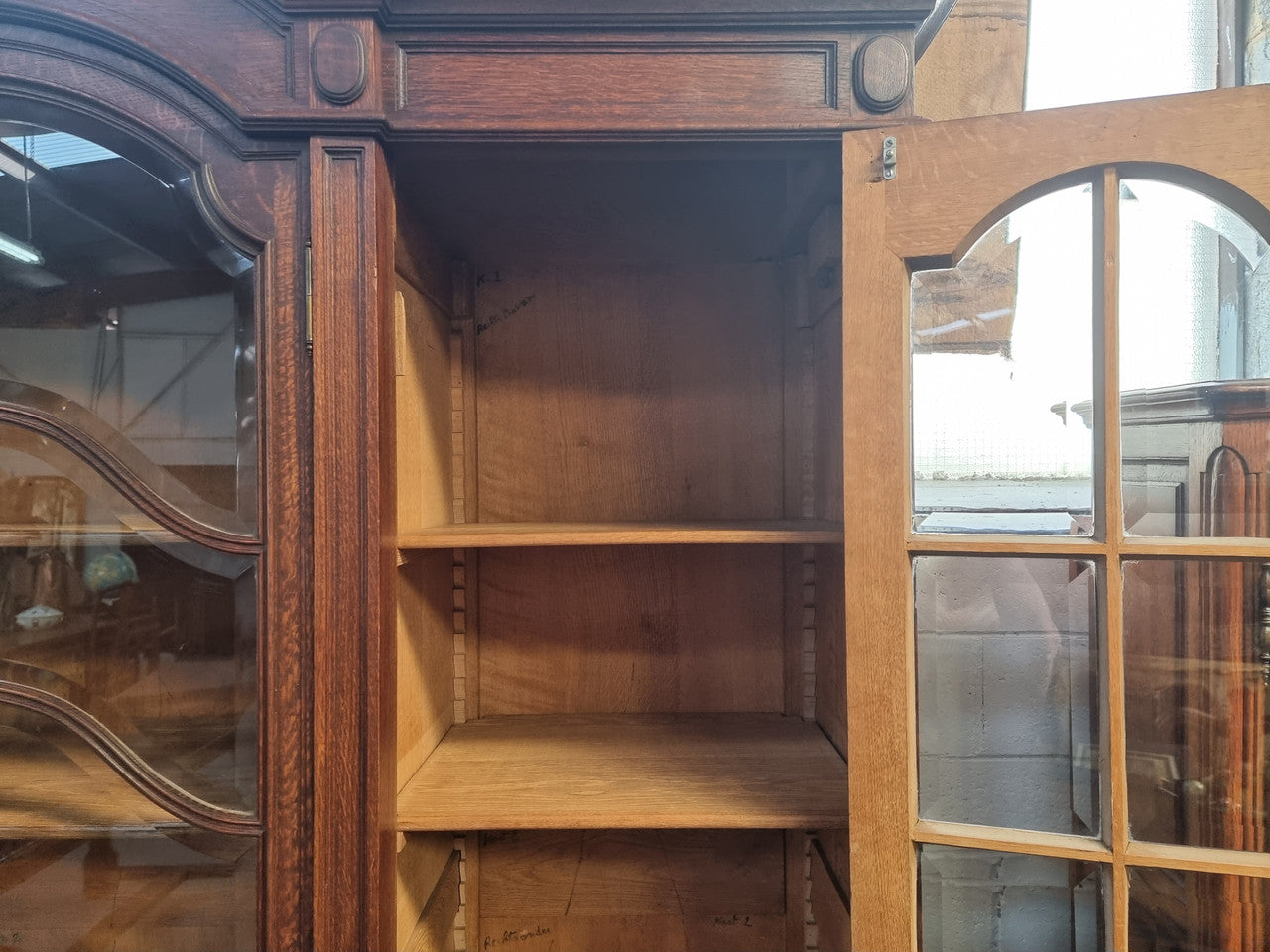 Late 19th Century French Oak three door bookcase. It has fully adjustable shelfs and is in good original detailed condition.