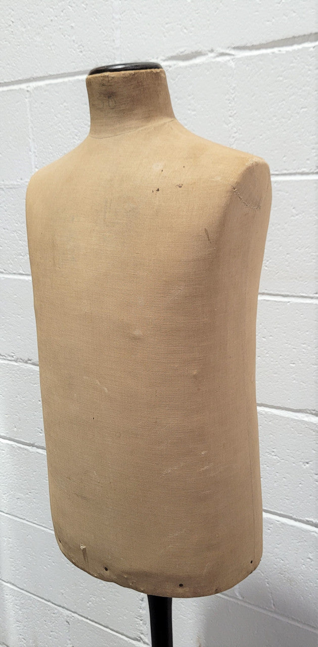 Vintage fabric covered child mannequin on adjustable wooden base. In good original condition.
