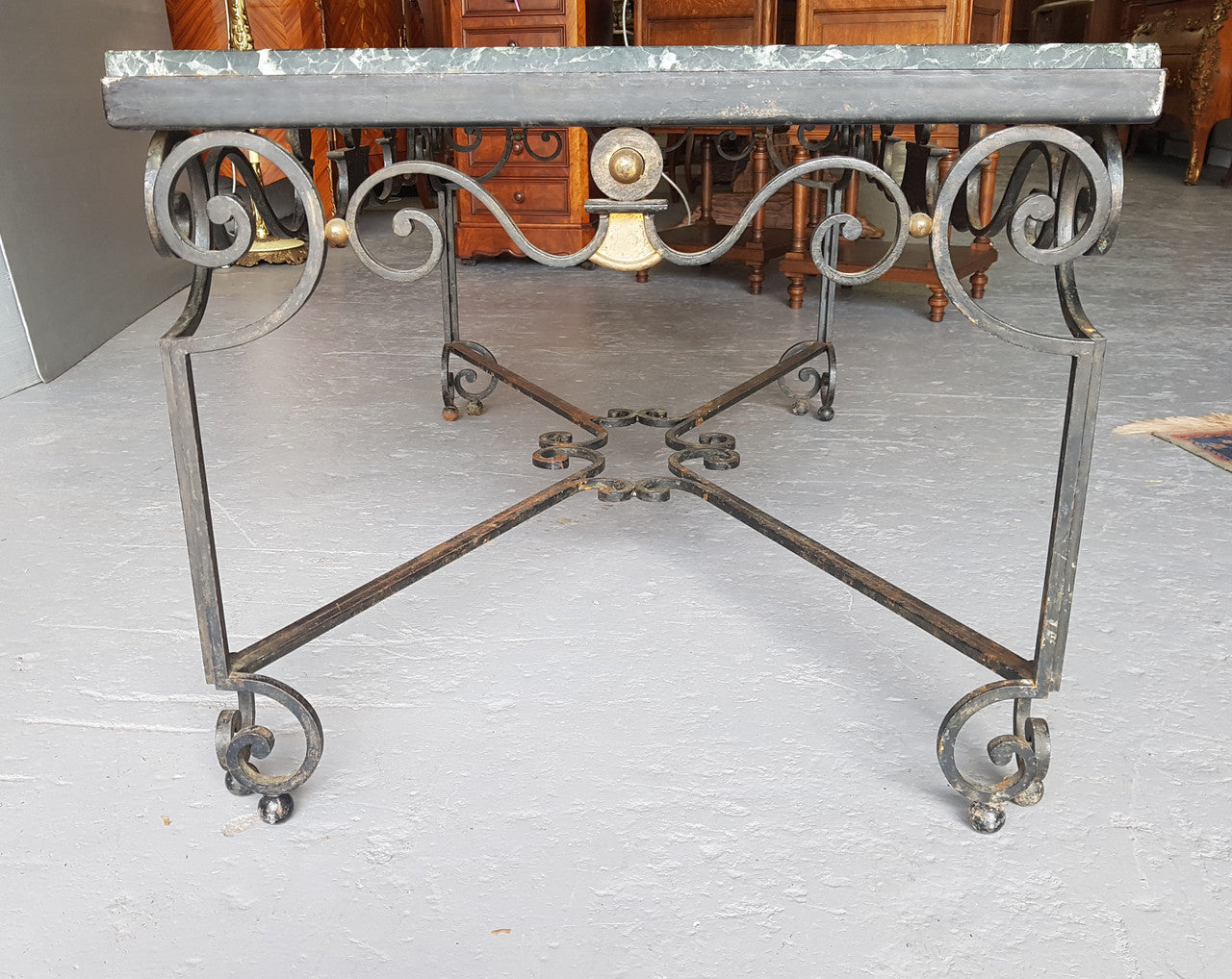 Wrought iron Coffee Table With An Attractive Green Marble Top