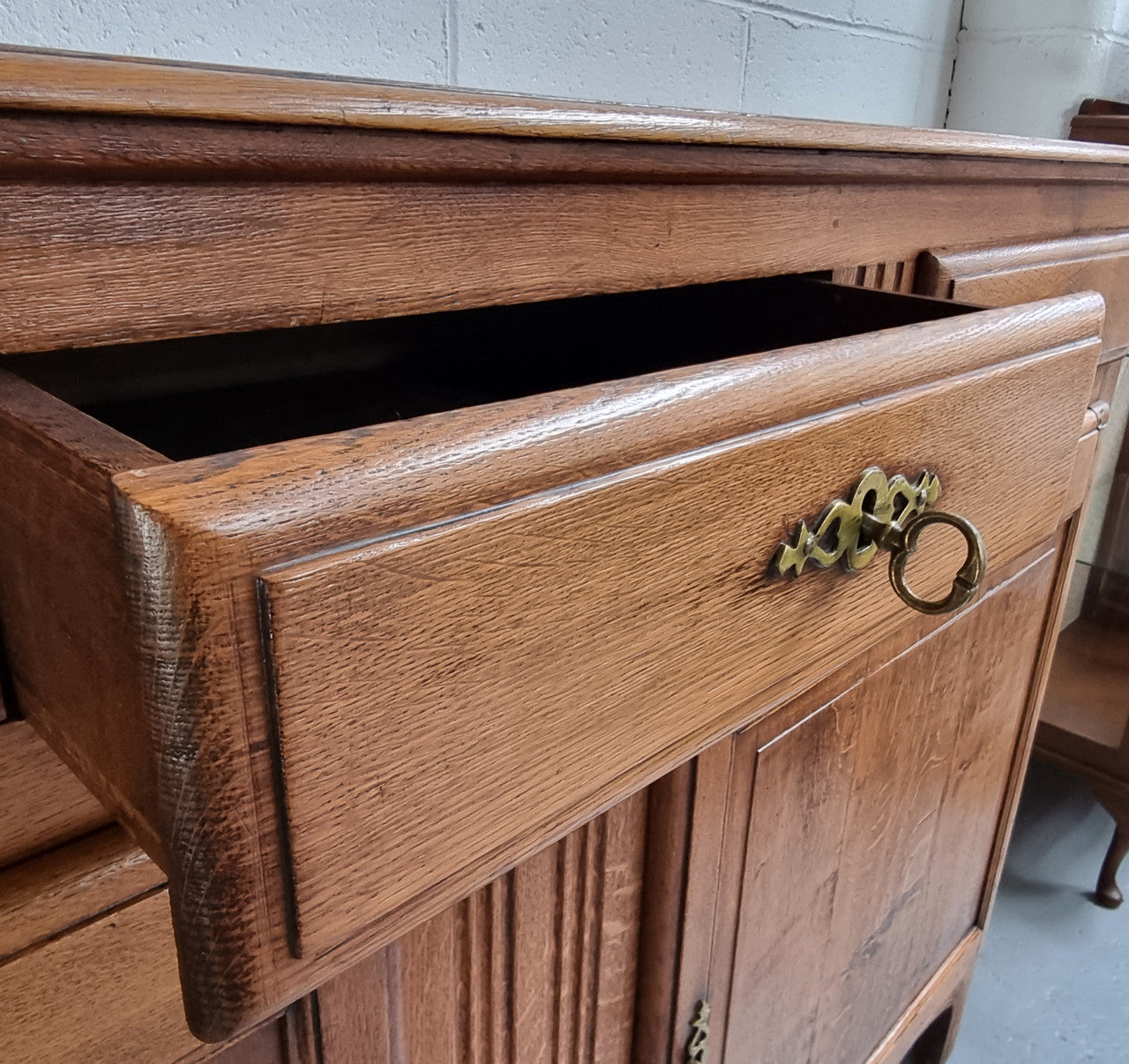 French Oak Early 19th Century sideboard with two doors and three drawers. In good original condition.