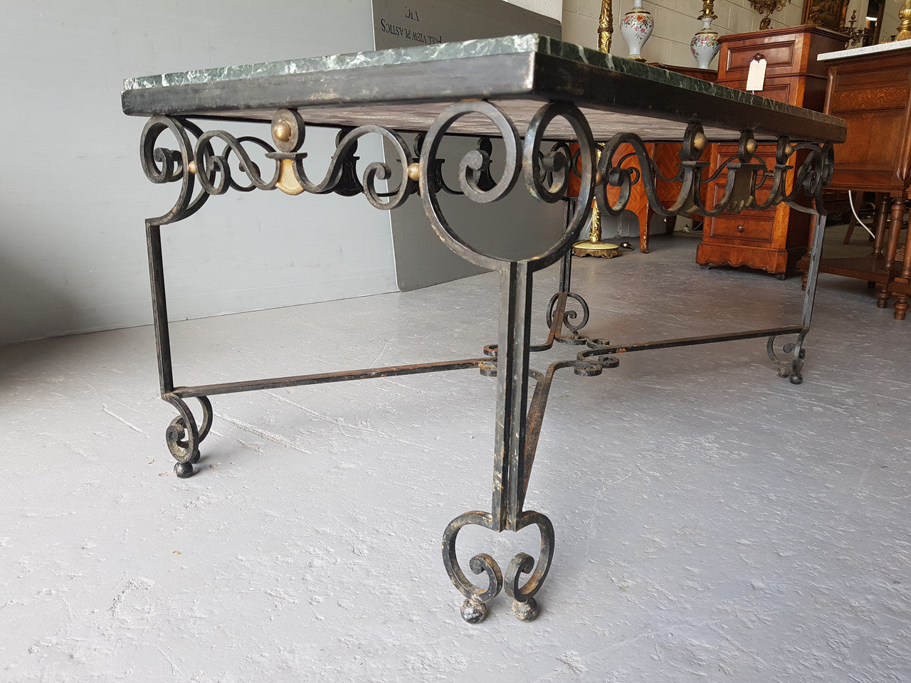 Wrought iron Coffee Table With An Attractive Green Marble Top