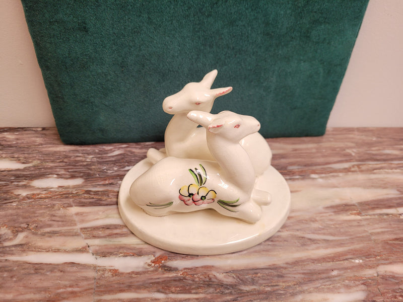 Goldscheider Myott Art Deco figurine of two Gazelle figures with hand painted flowers.  Backstamp dates the figures to 1938-1950 period.  There is some light crazing.