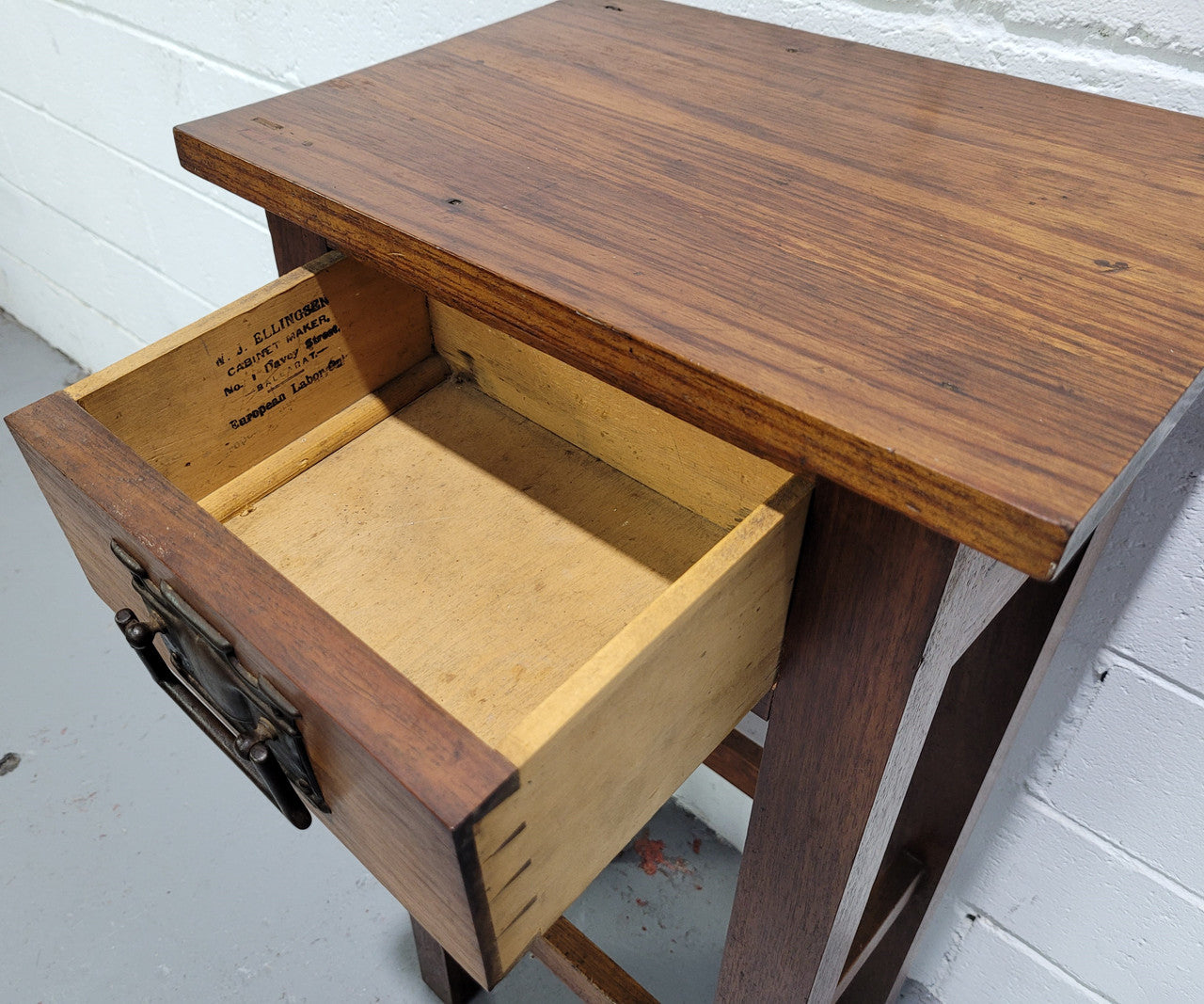 Small Arts and Crafts side table/bedside table. With drawer and is in good original detailed condition.