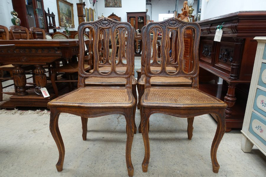 Fabulous set of 6 French oak dining chairs with cane seating in fantastic original condition.