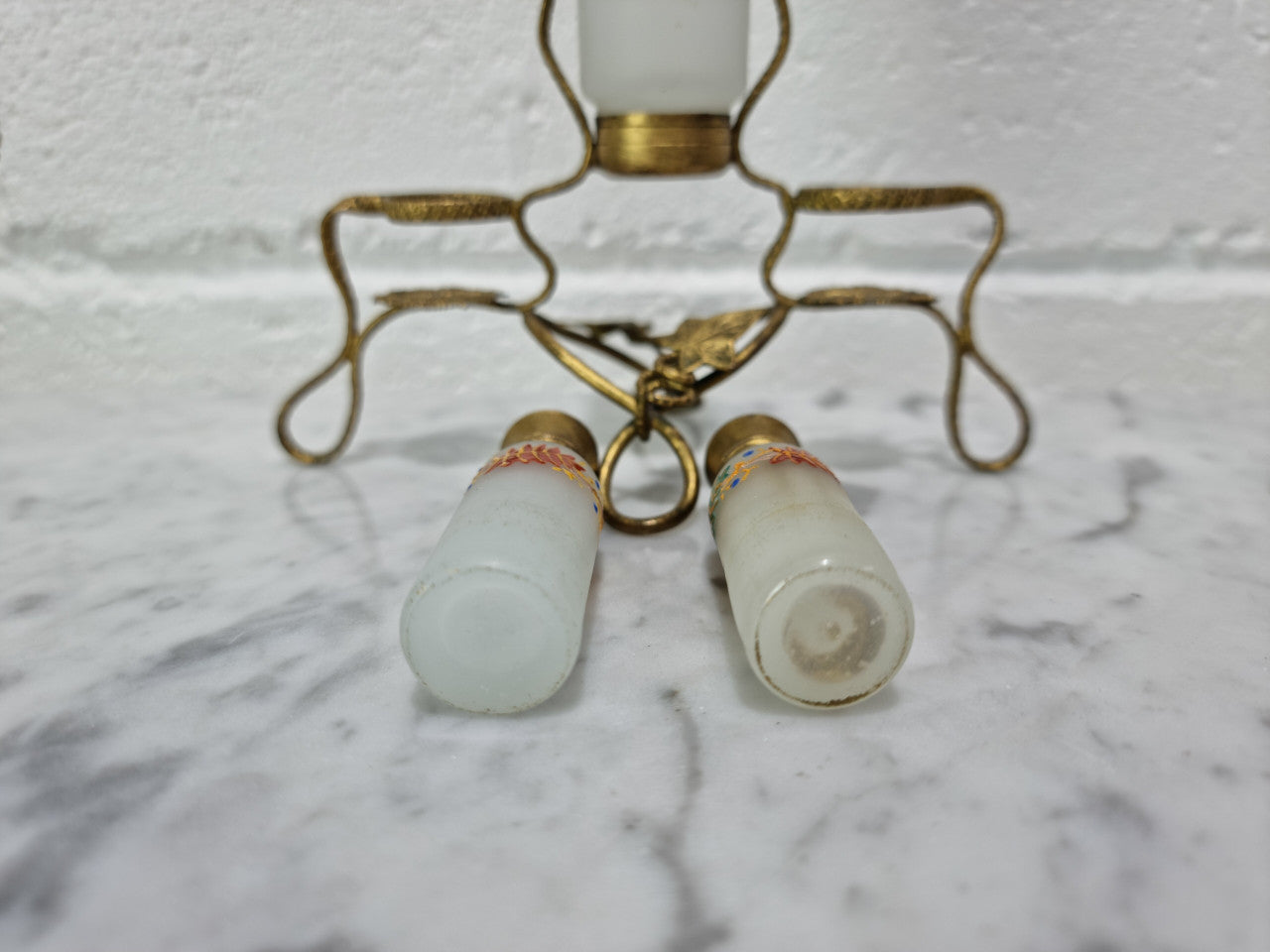 French 19th century perfume set in a gilt metal stand. Opaline glass beautifully hand painted and is in good original condition, please view photos as they help form part of the description.