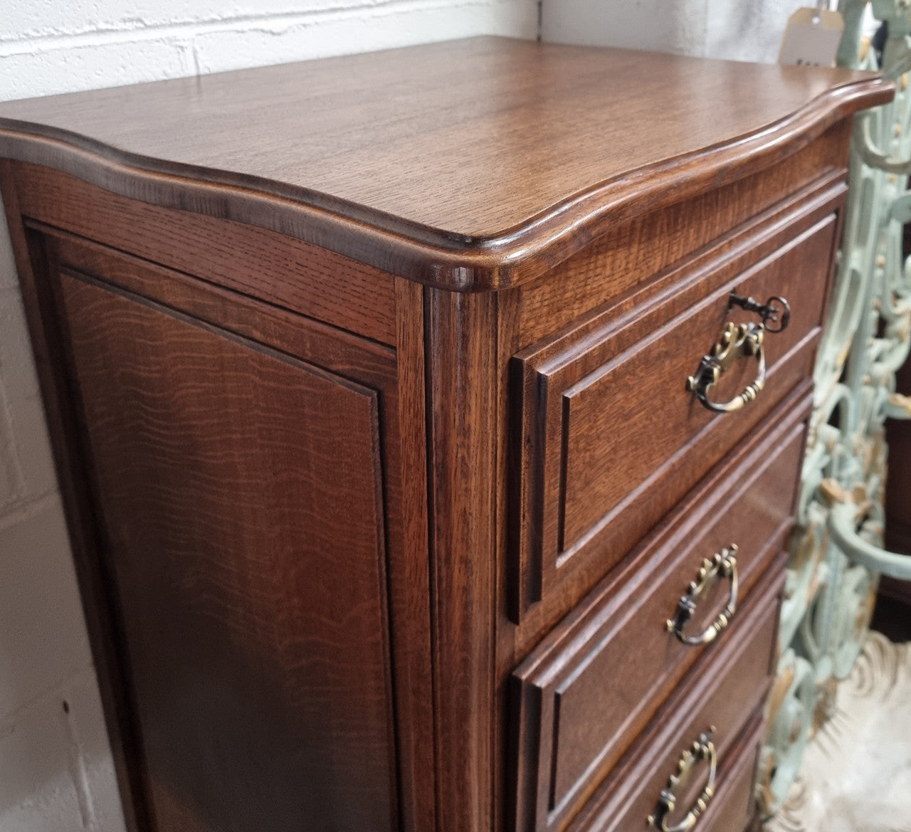Elegant French Oak Louis XV style four drawer chest of drawers. It has lovely carvings and it is in good original detailed condition. It has been sourced from France.