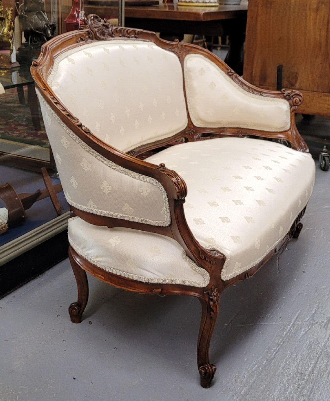 Pretty French Louis XV style small Walnut settee with very good upholstery. Sourced from France and in good original condition, please view photos of the upholstery as it helps form part of the description.