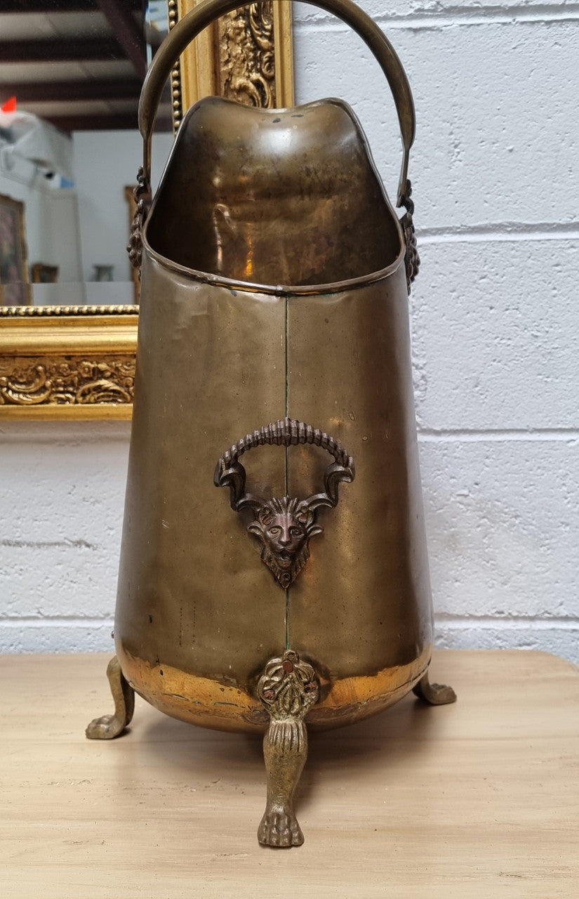 French brass coal bucket with Lion heads. In good original condition.