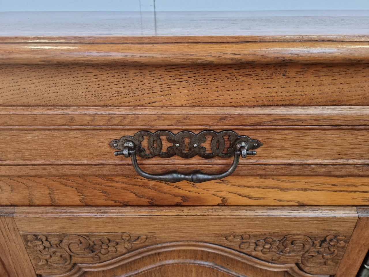 Lovely French Oak three-door sideboard with beautifully carved details and there is also a drawer. In good original detailed condition.