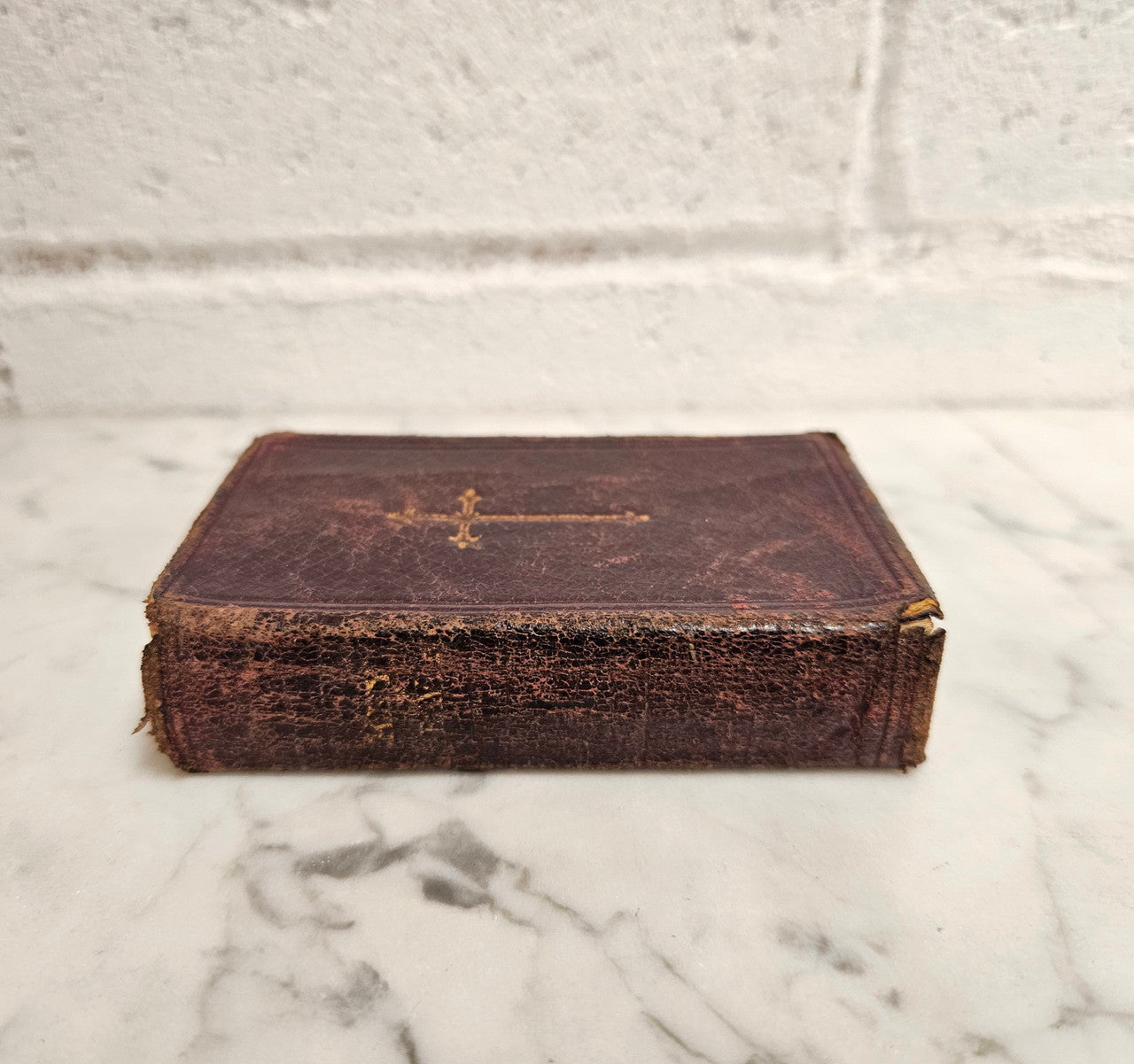Very small antique leather bound Key of Heaven Manual of Prayer Book printed by M H Gill & Son Dublin. Condition commensurate with age.