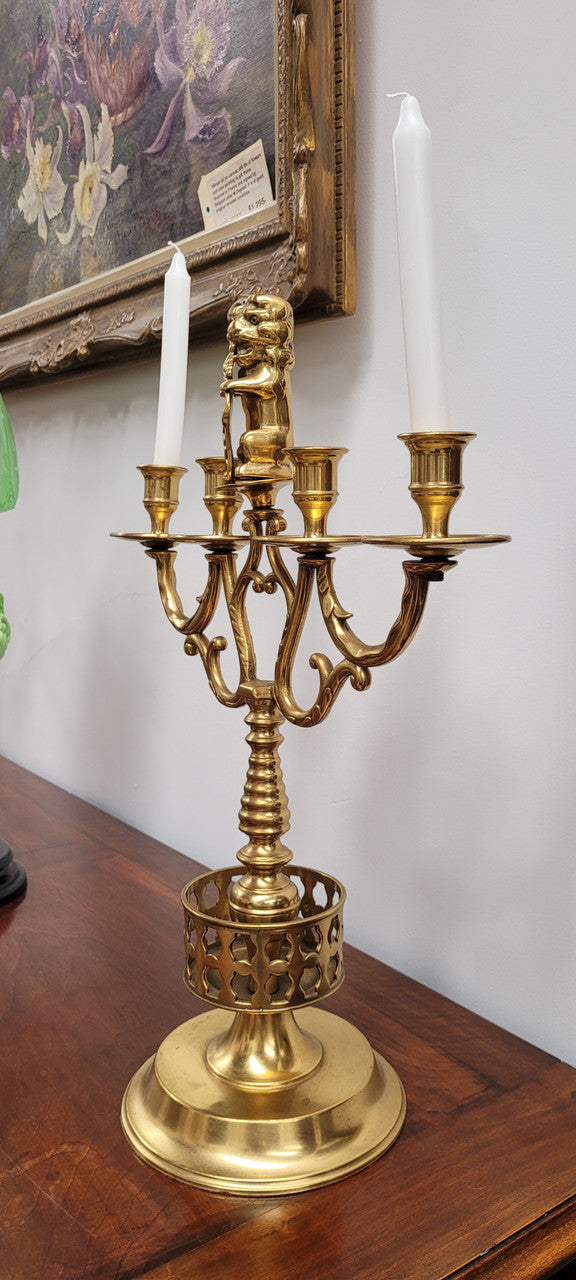 Pair of large Antique French Brass candelabras with lions. They have been sourced from France and are in good original detailed condition.