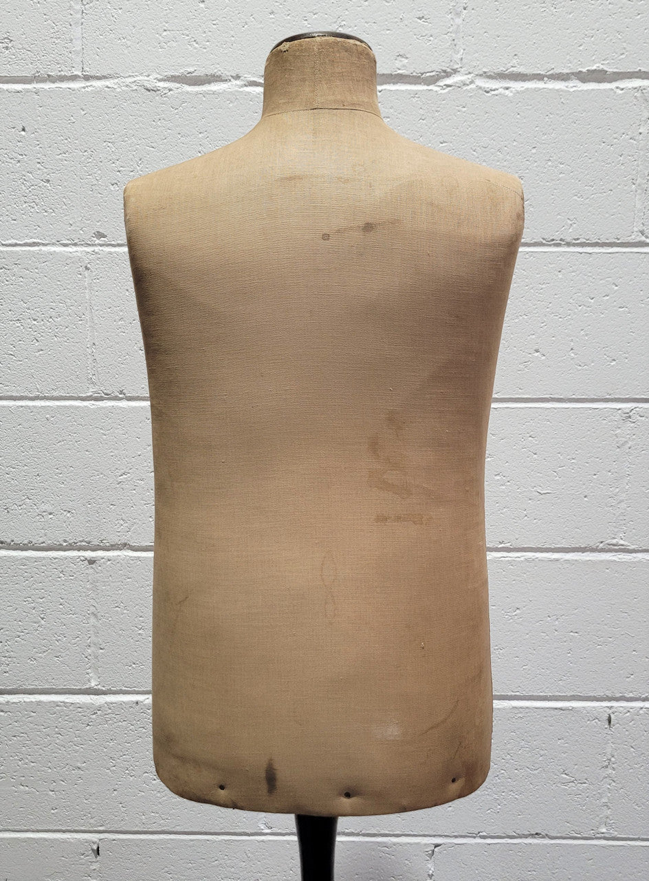Vintage fabric covered child mannequin on adjustable wooden base. In good original condition.
