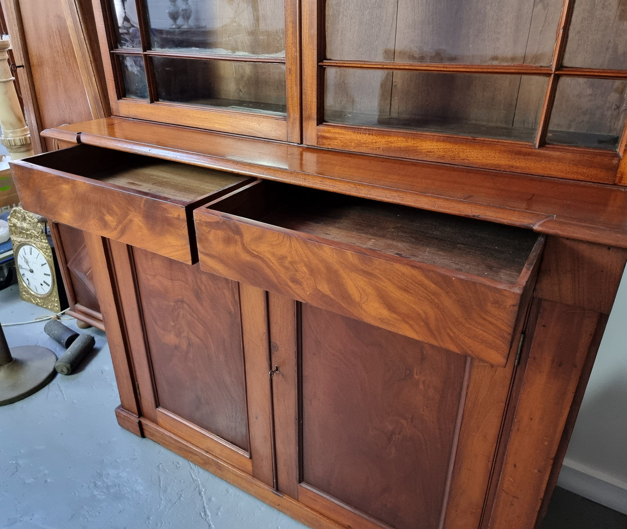 Rare early Australian colonial full Cedar bookcase. Plenty of storage underneath and glass top doors open up too three fully adjustable shelves. In good restored condition.