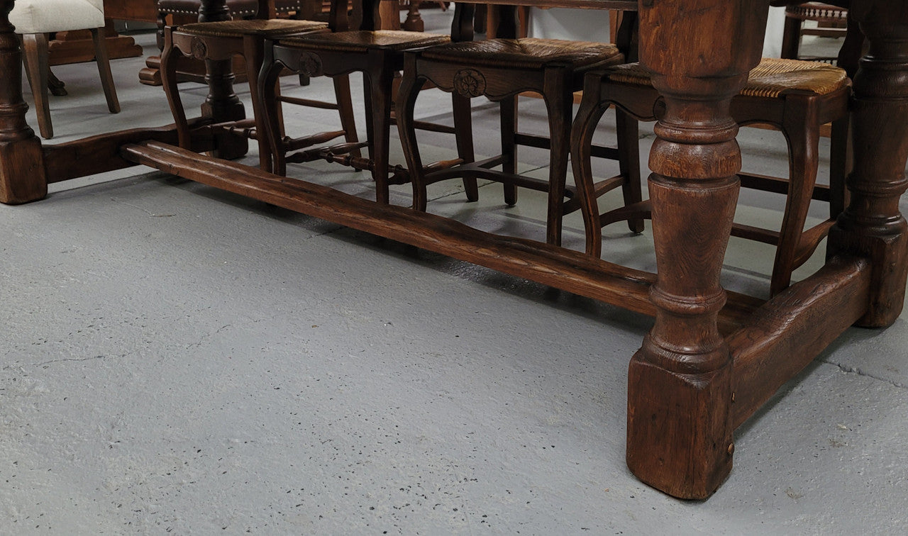 Amazing 2.65 meter French Elm Refectory dining table with loads of rustic charm. This table has been sourced from France and can comfortably seat ten people. It is in good original detailed condition.
