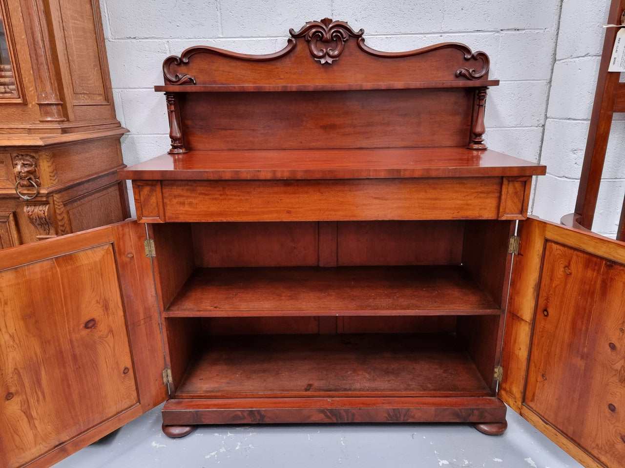 Beautiful Antique Rosewood Chiffonier with a cupboard, two doors and a drawer for all your storage needs . In good original detailed condition.