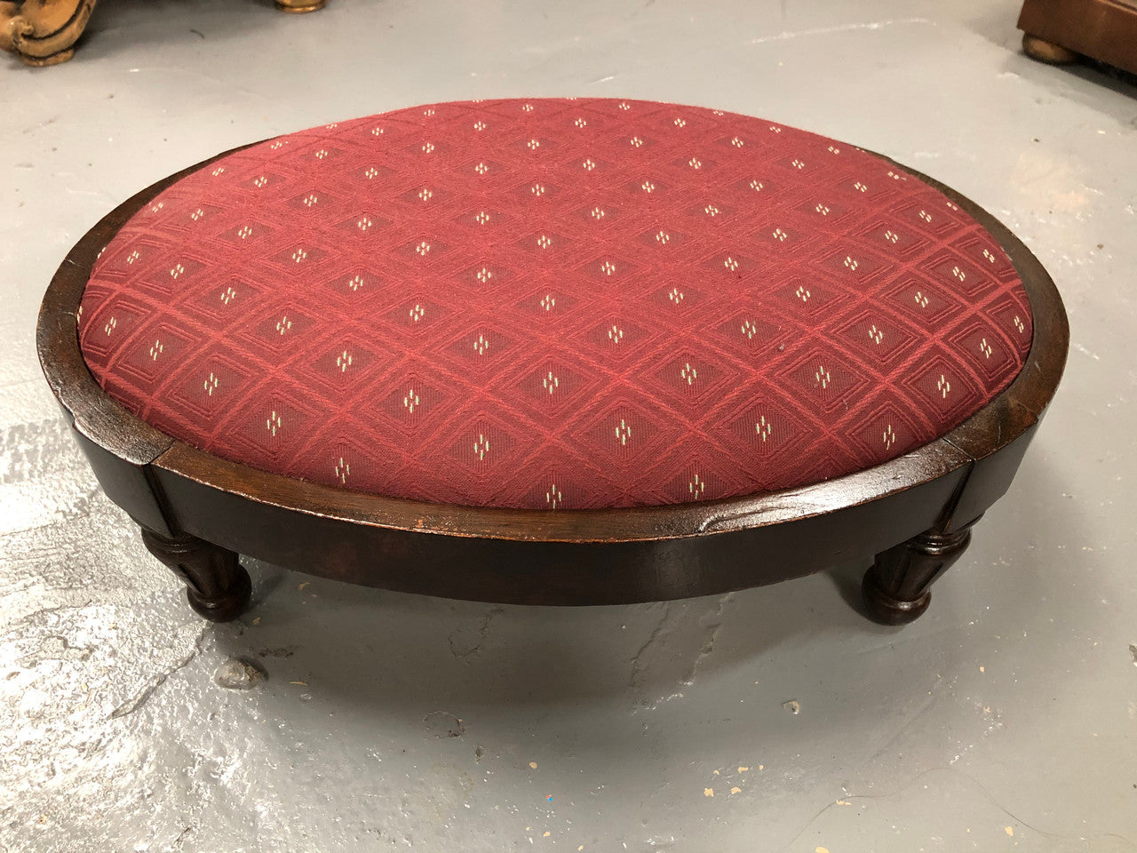 Upholstered Antique Mahogany oval foot stool. In very good original condition.