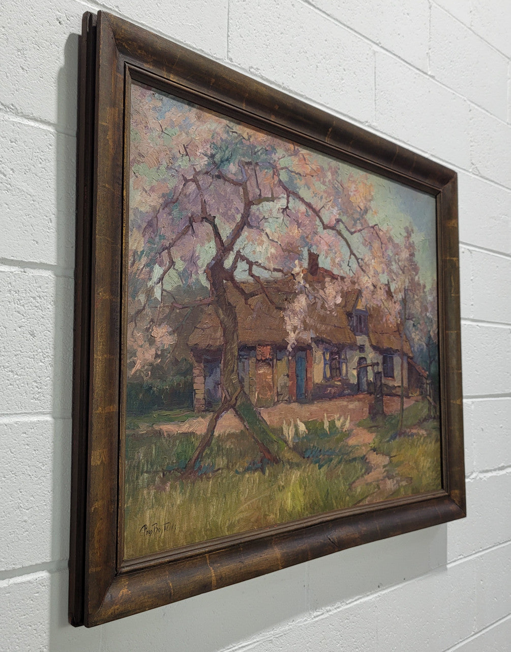 Stunning French oil on canvas signed by Prosper Bosteels (1881-1964). Depicting painting of a house with a flowering cherry tree and in a gilt frame. In good original detailed condition. Sourced from France.