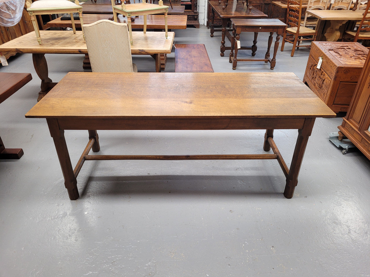 Stunning French oak stretcher base table, that has been sourced from France. It is in good original condition. Please see pictures to form part of the description.