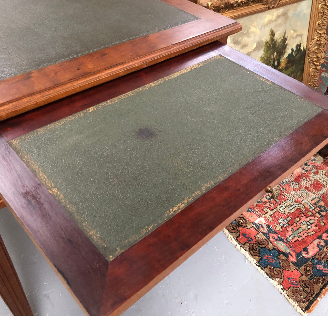 Lovely French Mahogany Louis XVI style leather top desk. With beautiful ormolu details and three drawers. There are also two slides on either side with tooled leather tops and in good original detailed condition.