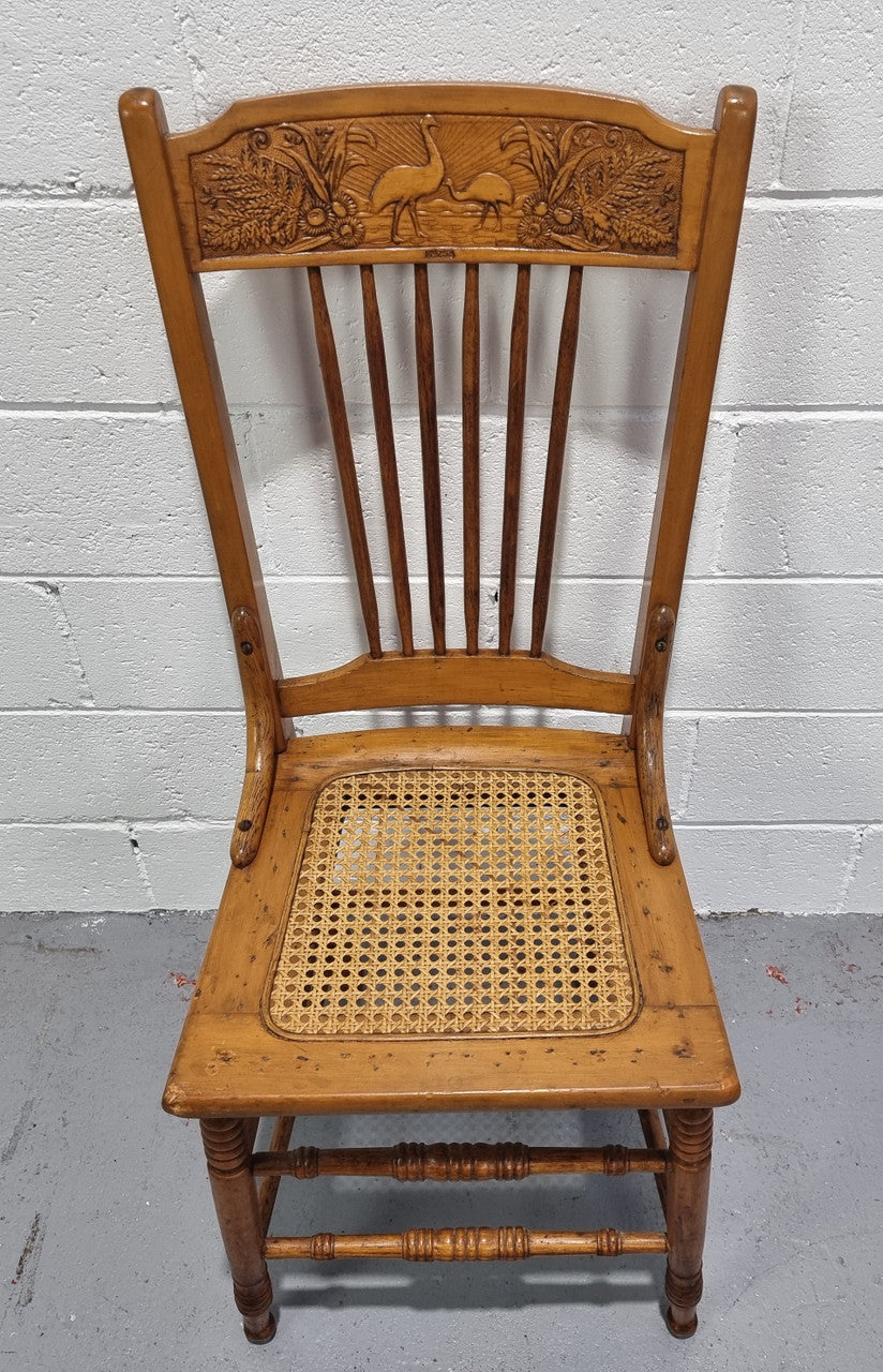 Australian Emu chair with cane inset seat. In good original condition.