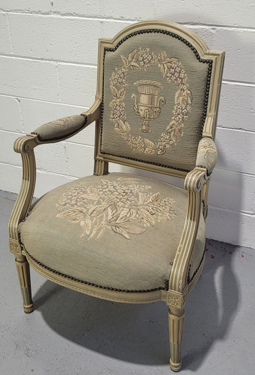 Lovely Louis XVI style painted fauteuil with lovely sage coloured tapestry upholstery. In good original condition.