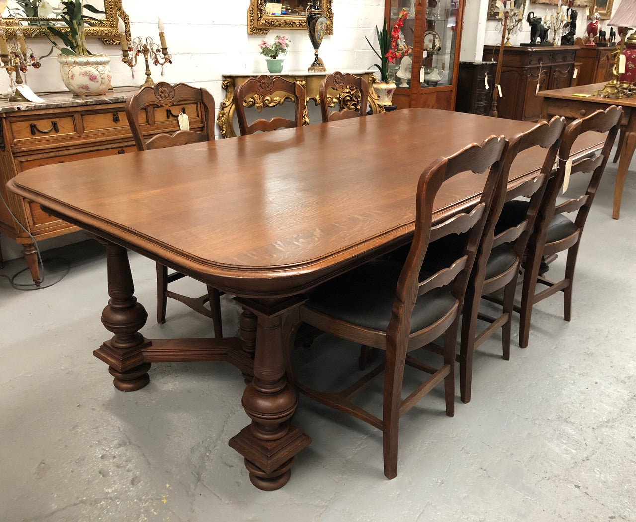Large French Oak 19th century Henry II style dining table. It can seat 8 very comfortable and being very wide at 119 cm there is plenty of space to sit 10. In good original detailed condition.