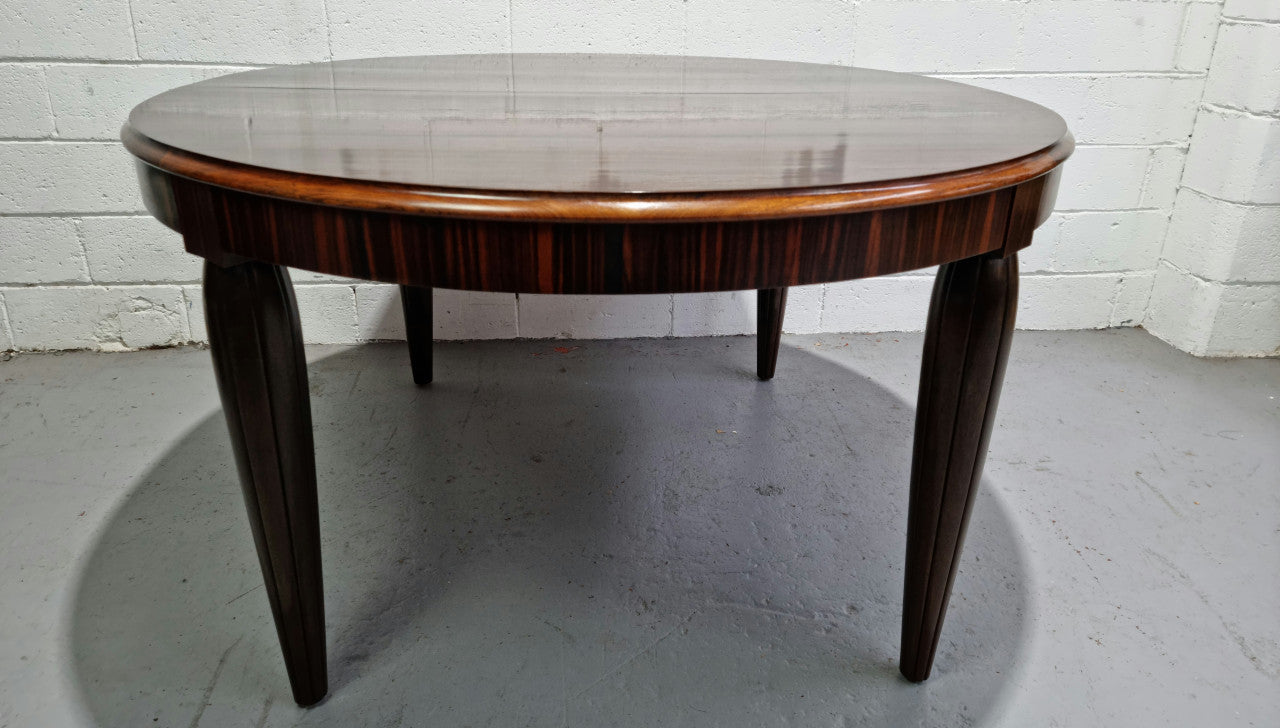 French Art Deco Macassar Ebony circular dining table by "Jules Leleu". In very good original detailed condition.