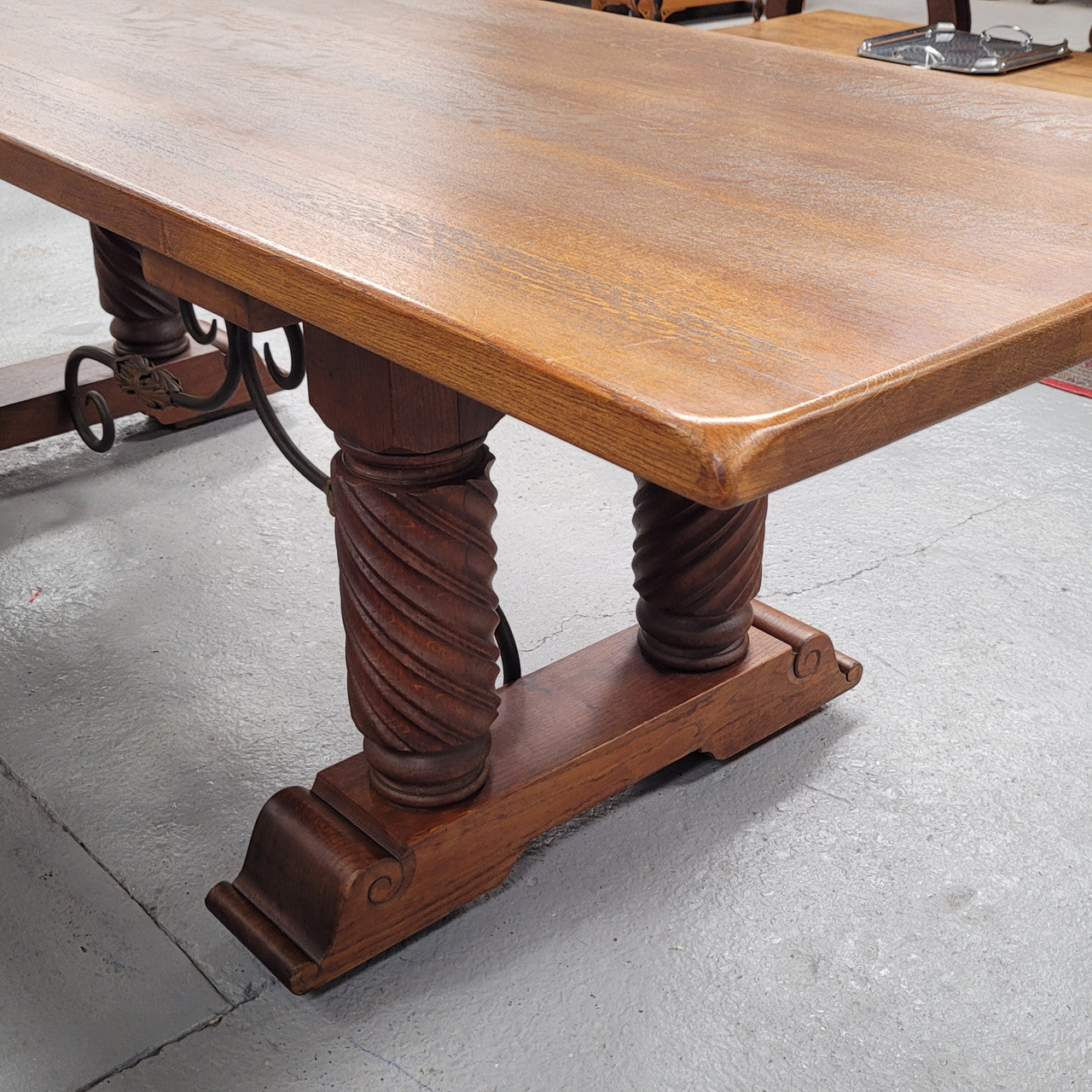 Amazing French Oak Spanish Renaissance style dining table with beautiful decorative iron work. It has been sourced from France and can comfortable seat 8- 10 people. Sourced from France and is good original detailed condition.
