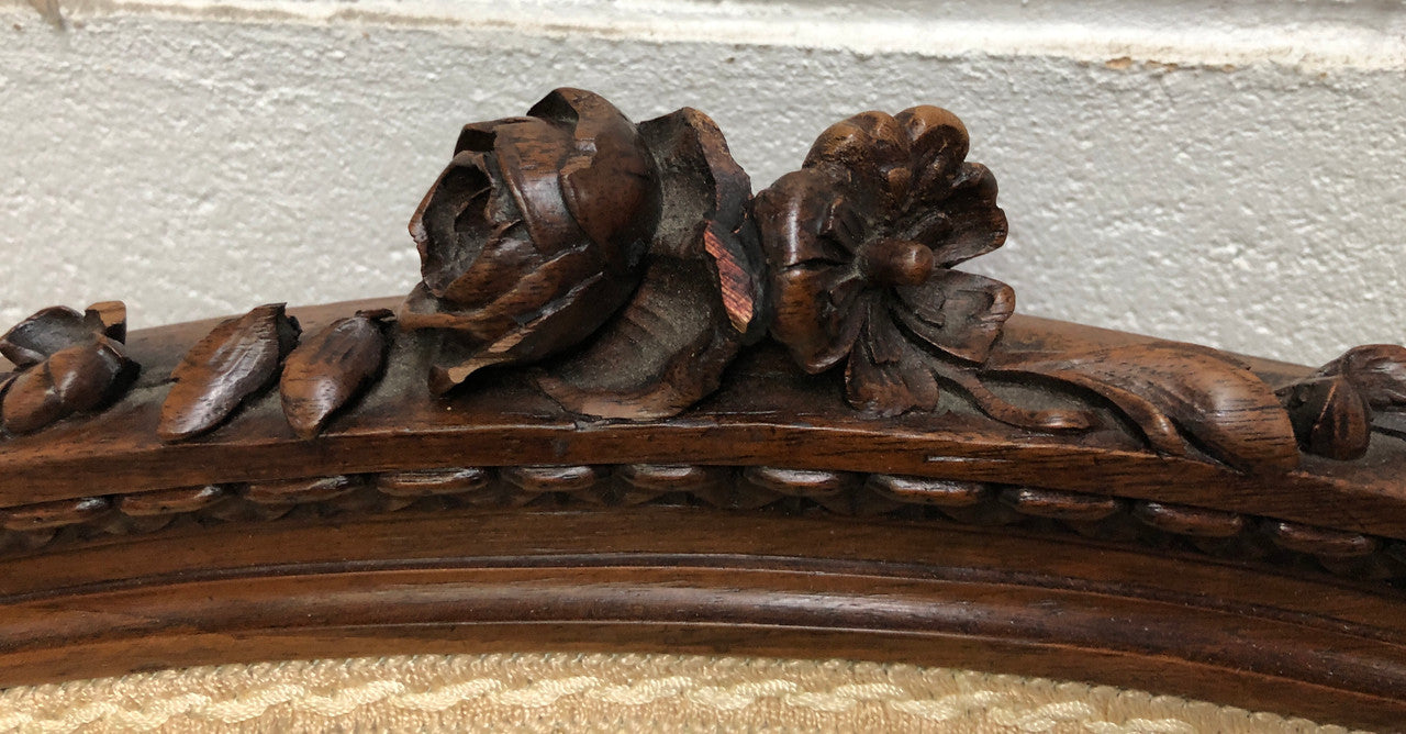 Beautiful pair of Vintage French Walnut Louis XVI style carved Fauteuils with lovely upholstery and wide seats . In good original detailed condition.