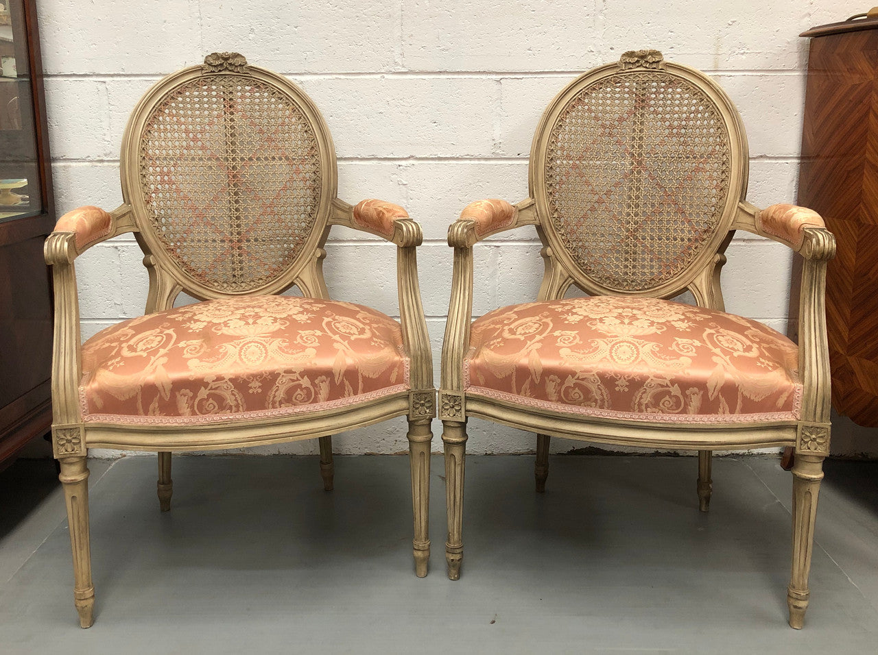 Pair Of French Louis XV Style Cane Back and Upholstered Seat Fauteuils
