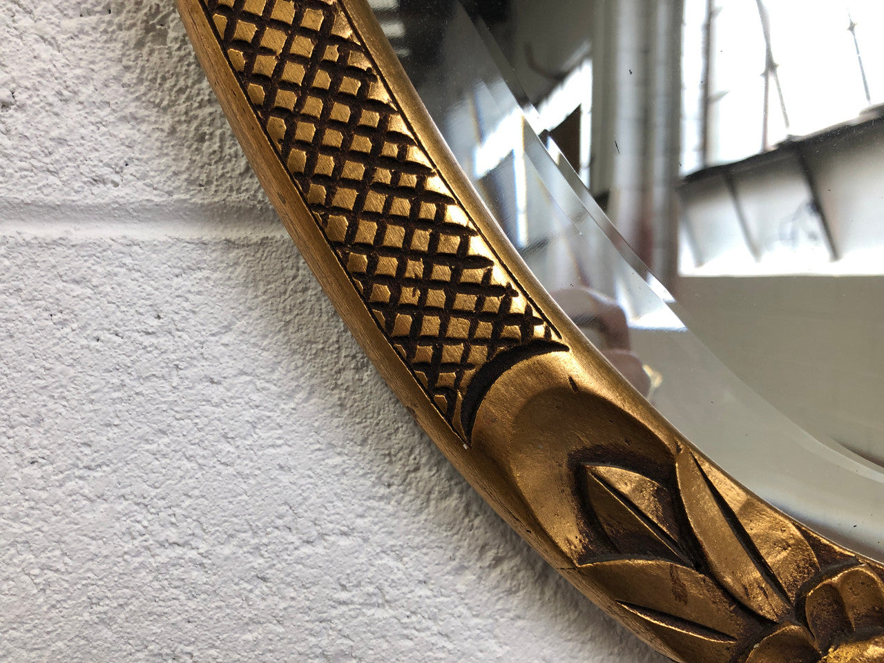 Beautiful French decorative Art Deco giltwood wall mirror with lovely floral detail. Contains its original mirror and is in good original condition.