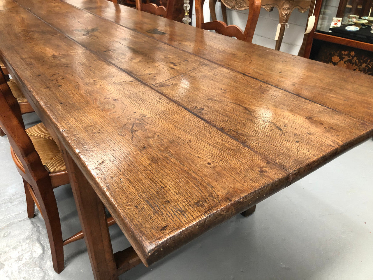 19th Century French three meter Farmhouse table with a beautiful original rustic top. In very good original detailed condition.