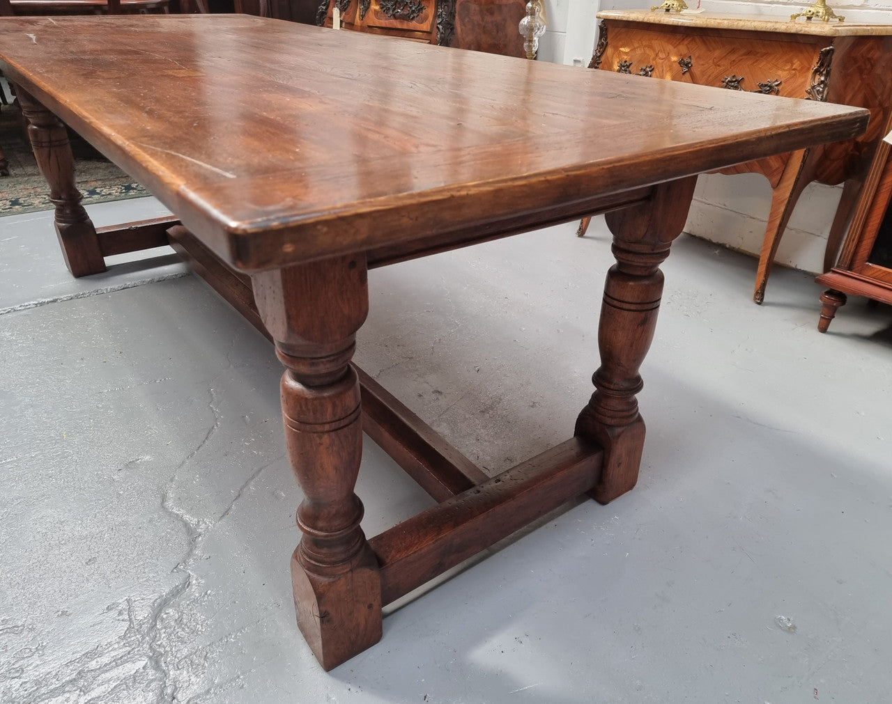 Vintage French Oak stretcher base farmhouse table. It is in good original condition.