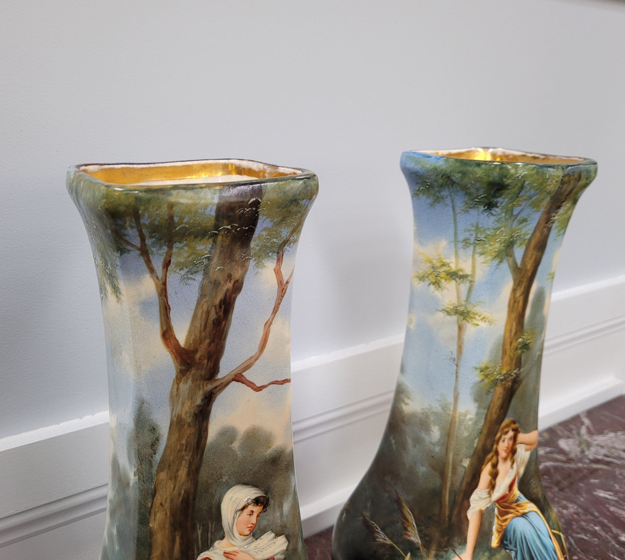 Pair of Victorian hand painted decorative vases depicting women. Please view photos as they help form part of the description.