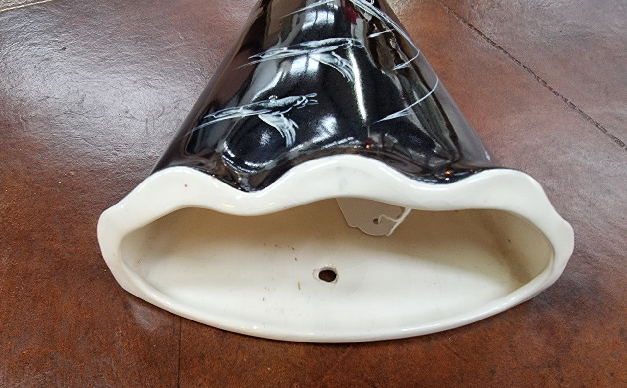 Charming vintage wall pocket vase. Black with hand painted cream ducks. Length 19.5cm Width 14.5cm Marked W26 on the rear.