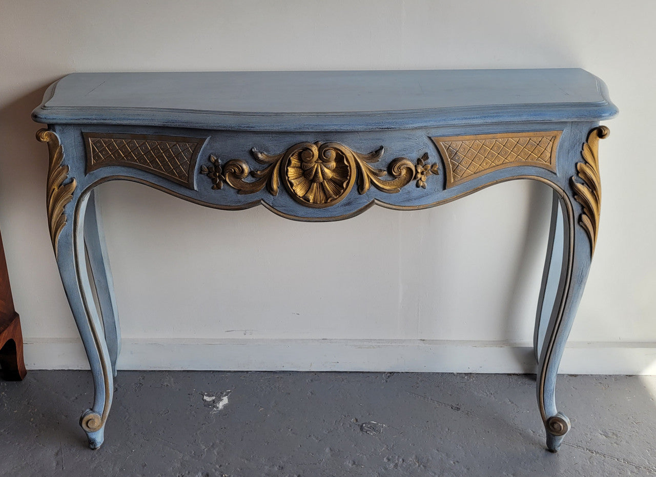 Stylish Louis 15th style console table with chalk paint and gilded highlights. They have been sourced from France and is in good original condition.