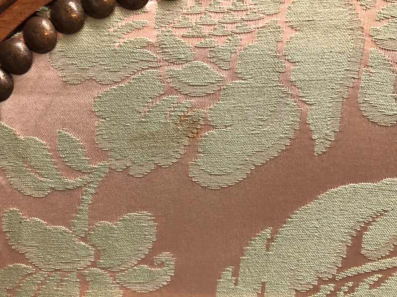 An antique French Walnut louis XVI style 3 fold screen/divider. Upholstered with beautiful pink silk brocade fabric. The fabric is in good overall condition with some minor wear and tear which is expected for its age. It has been sourced directly from France. Please view photos as they help to form part of the description and condition.