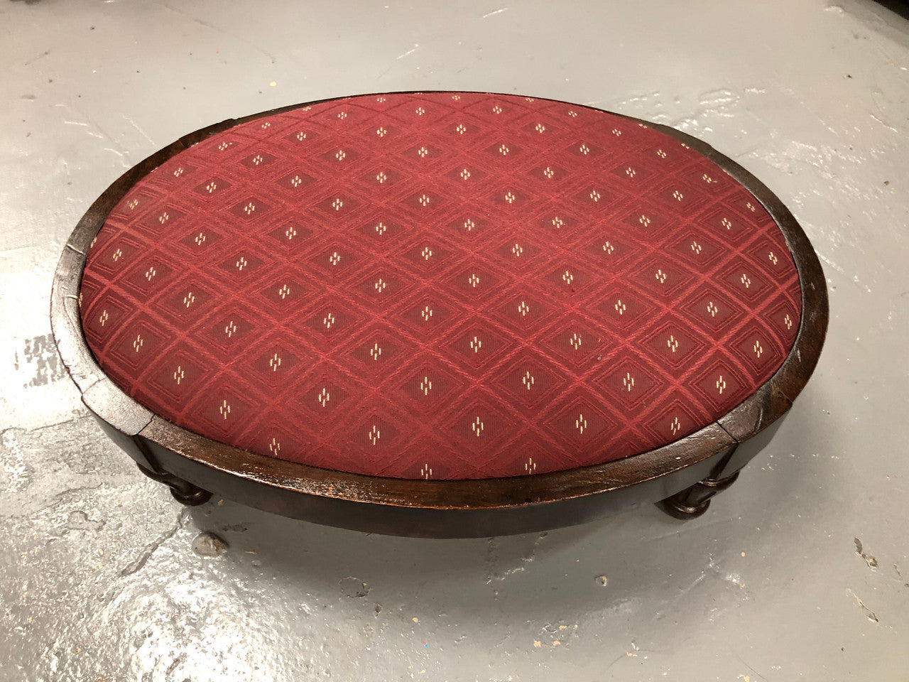 Upholstered Antique Mahogany oval foot stool. In very good original condition.