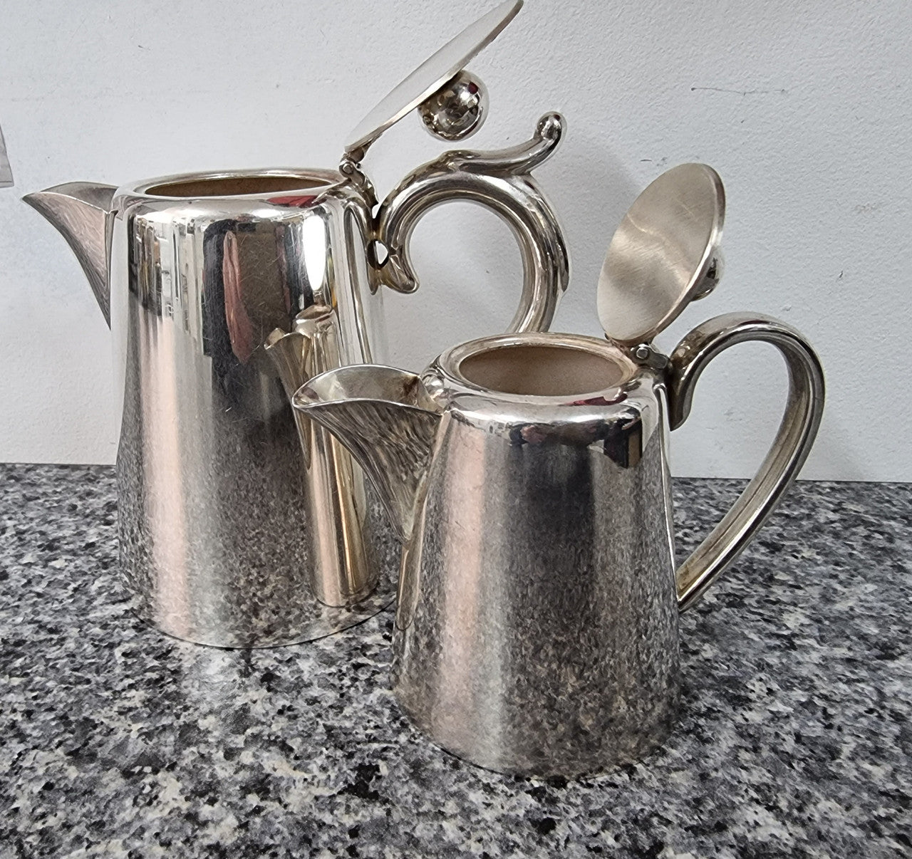 Pair of Vintage Silver-Plate water and milk jug. In good condition please view photos as they help form part of the description.