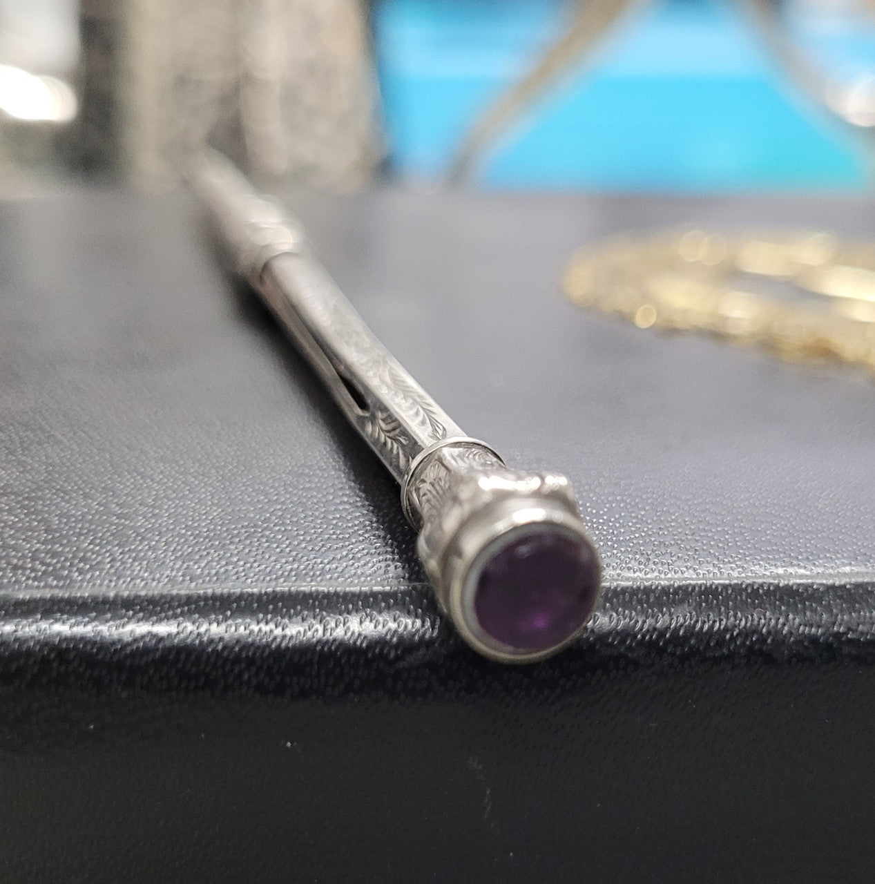 Interesting sterling silver and amethyst propelling and extending pencil. In good original condition, please view photos as they help form part of the description.