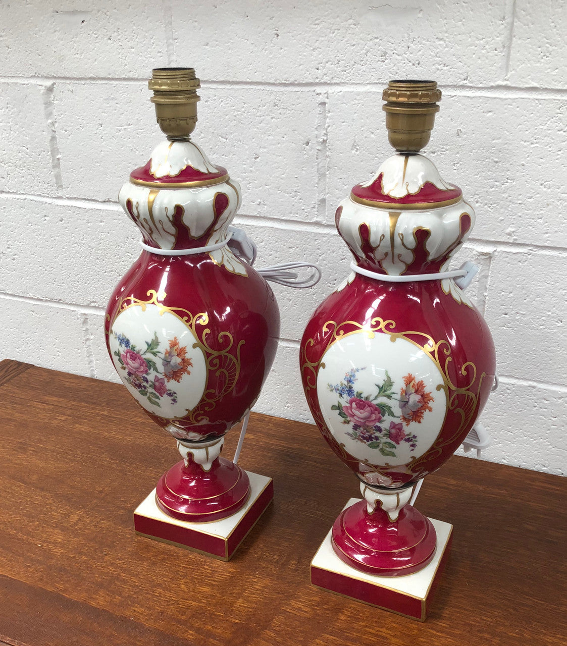 Pair of highly decorative Paris Porcelain table lamps. They are wired to Australian standards and are in very good original condition. Circa 1950's.