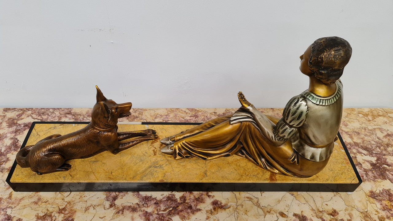 Art Deco sculpture of lovely seated lady with German Shepherd signed by signed by H.Molins. In good original detailed condition.