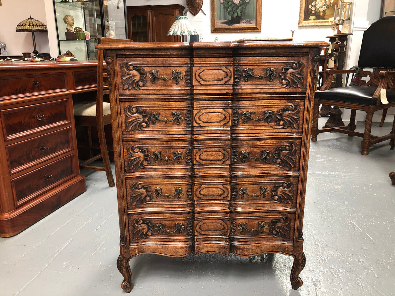 French Oak miniature chest of five drawers with serpentine shaped front. In very good original detailed condition.